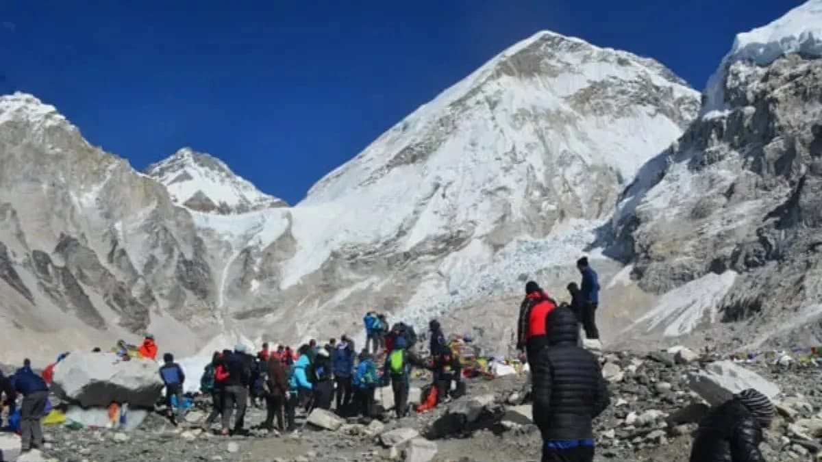 Trekkers with packed bags at Everest Base Camp