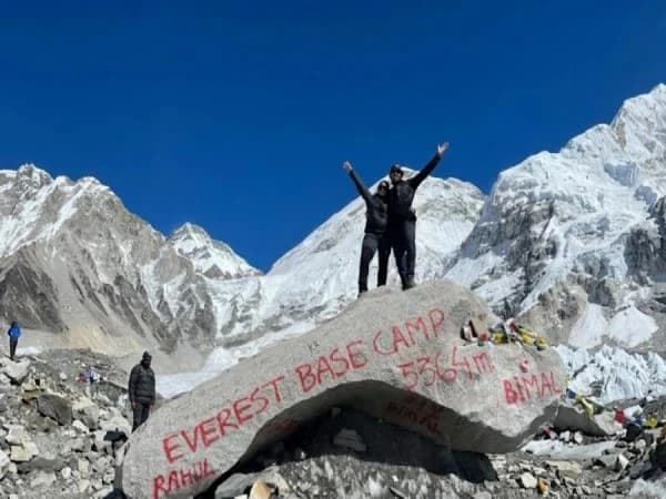 Couple trekking in Nepal Himalayas