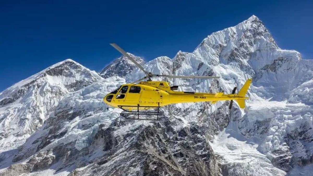 Helicopter tour above Everest region glaciers and snowy Himalayan peaks