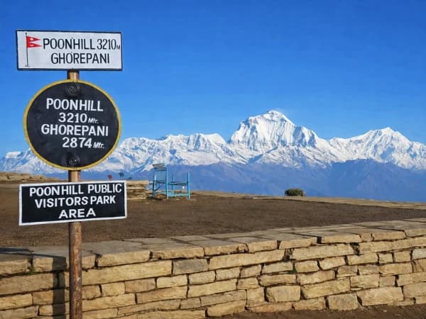 Sunrise view from Poon Hill with snow-covered peaks of the Annapurna Range and Dhaulagiri, seen from Ghorepani, Nepal.